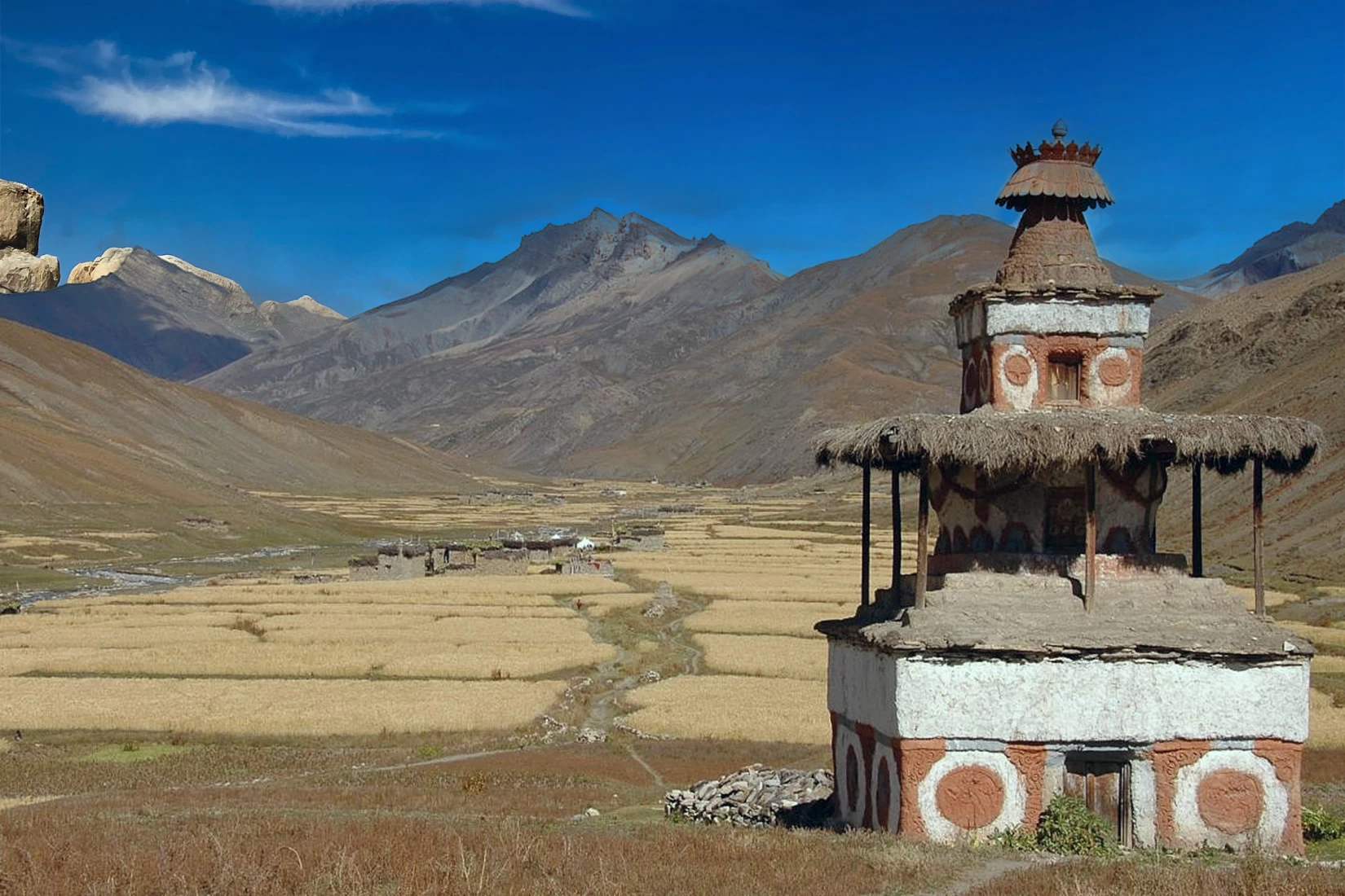 Chorten with barley fields at Tarap Valley in the southern part of Dolpa. <br> Photo Credit: Carsten Nebel